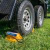 imageCamco Dual Standard RV Wheel Chock wRope  Heavy Duty Trailer Wheel Chock Constructed of Durable Plastic wUV inhibitors  Features Rope Handle for Easy Removal  Use wTires Up to 26in  44470Large w Rope