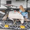 imageCamco FasTen Camper  RV Leveling Blocks  Features Interlocking Design for Customizable Height  Carrying Handle Twists to Secure Blocks for RV Storage  85 x 85 x 1 Yellow 10Pack 44512