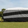 imageCamco ULTRAGuard Supreme RV Cover  Fits Travel Trailers up to 2426ft  Shelter Your RV from The Elements  Near Custom Fit Camper Cover Features Covered Air Vents amp Rear Cinching Straps 56130286  316